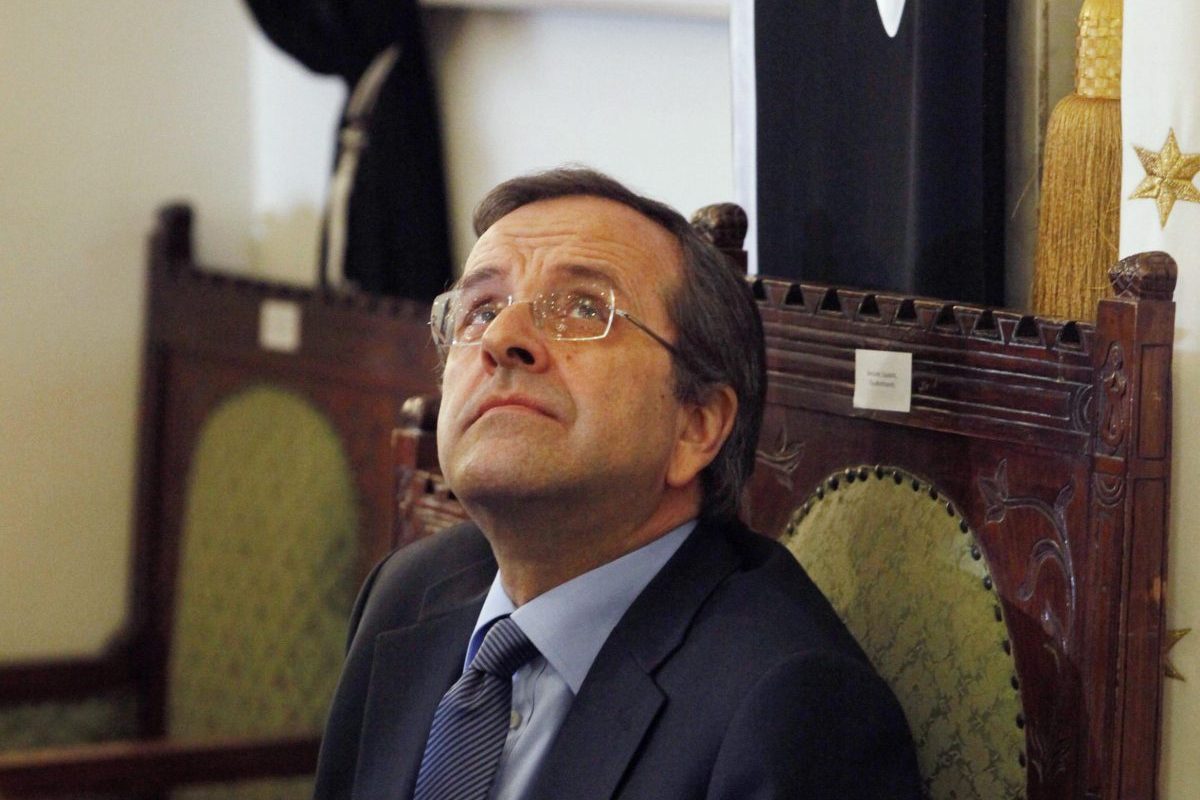 Greece’s Prime Minister Antonis Samaras attends a ceremony marking the 70th anniversary of the first deportation of Jews from Thessaloniki to Auschwitz inside the Monastirioton synagogue